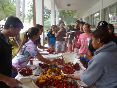 Chem Club members serving up hot &amp; spicy crawfish during the annual Crawfish Boil!